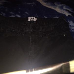 shiny black skinny jeans